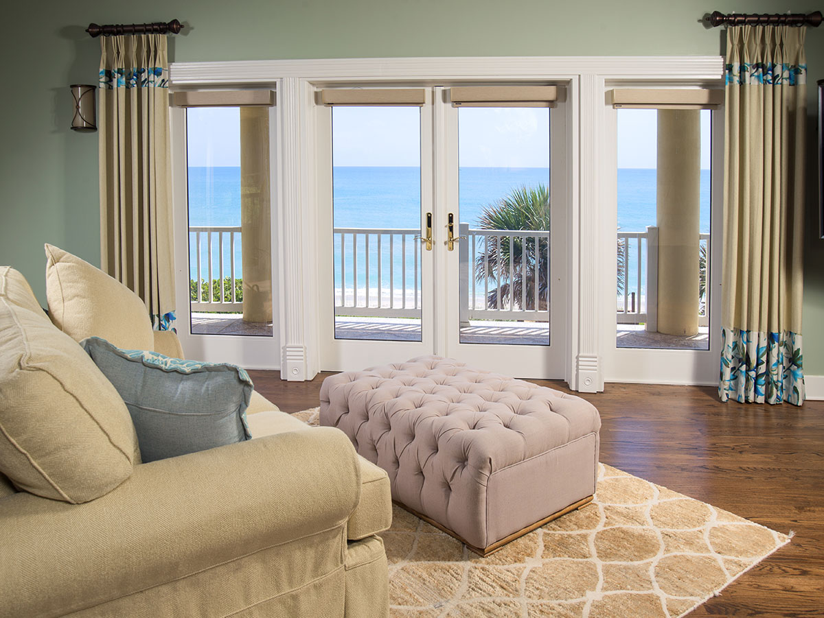 The master bedroom has an ocean front balcony