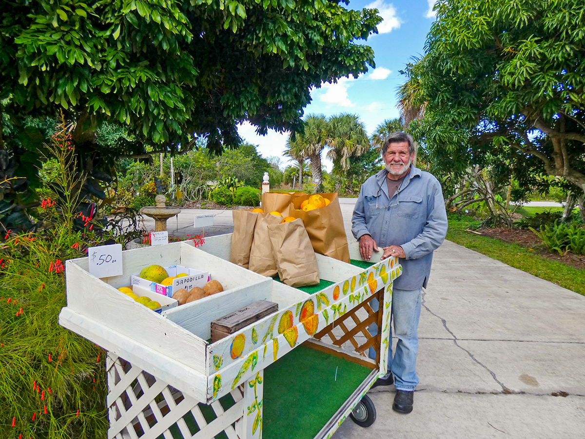 Hunt sells oranges and other fruit from a cart in front of his Merritt Island grove.