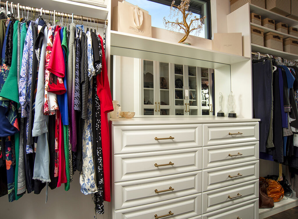 Custom his-and-hers closets provide plenty of space for treasures, including Michelle’s extensive collection of shoes.