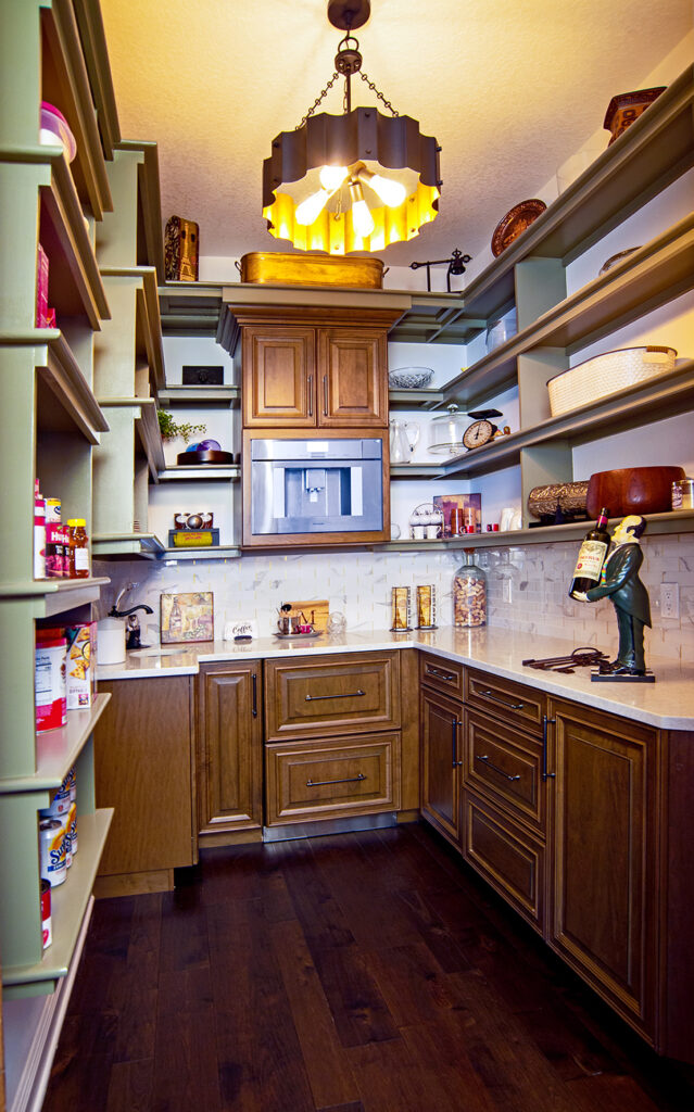 A pantry can be found behind the Gothic doors in the Muller kitchen.
