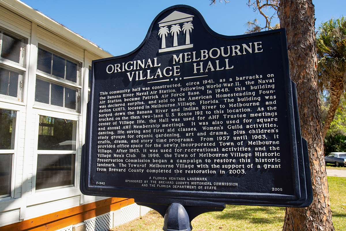 A historical marker at the village hall offers visitors a glimpse of its past.