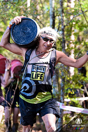 Tom Stokes competing at the Spartan race