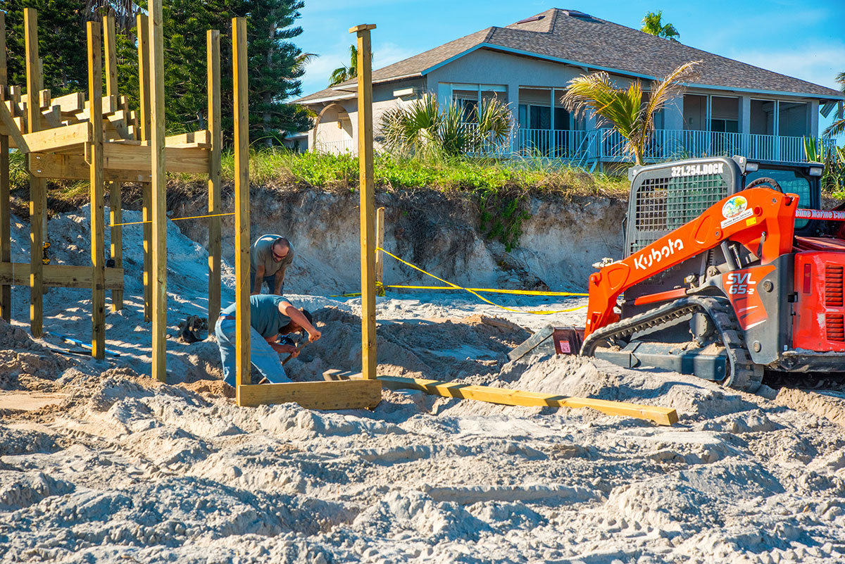 Workers are building a new beach access crossover