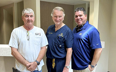 Don [W&J Construction], Dr. Schmid, and Ricky [W&J Construction]