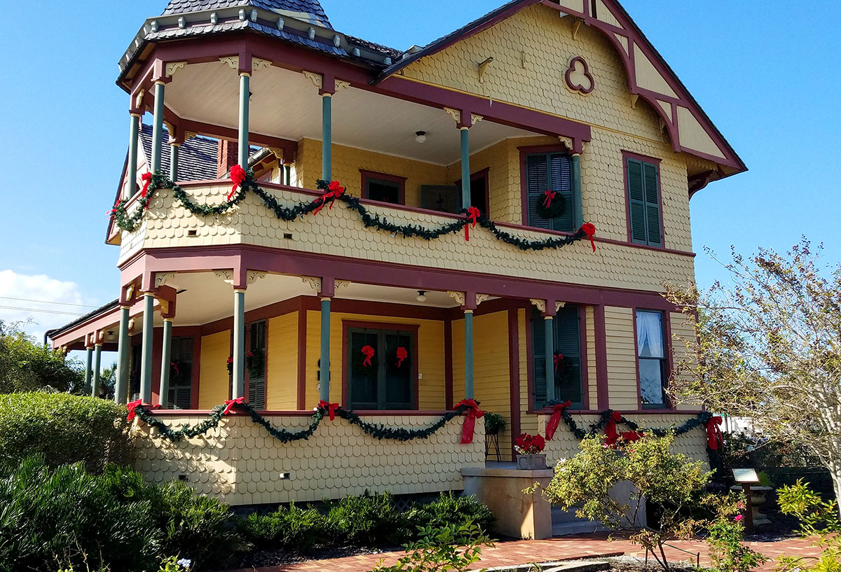 Holiday décor perfectly dovetails the elaborate Queen Anne style architecture of Pritchard House in Titusville.