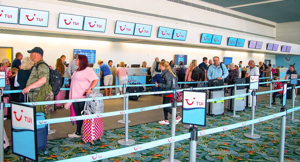 With numerous daily flights, the TUI ticket counter in the Melbourne-Orlando International Airport stays busy.