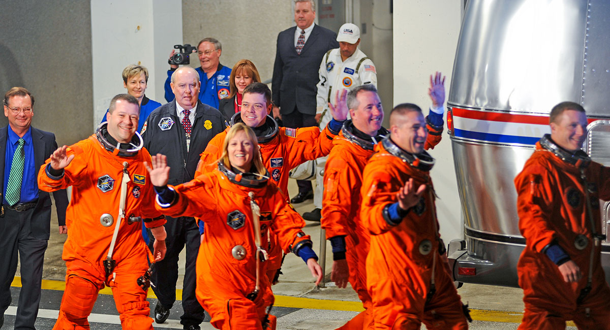 Astronauts getting ready to board the shuttle.