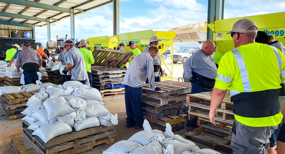 Melbourne city workers help to fill and stack sandbags when a hurricane threatens to flood the streets.